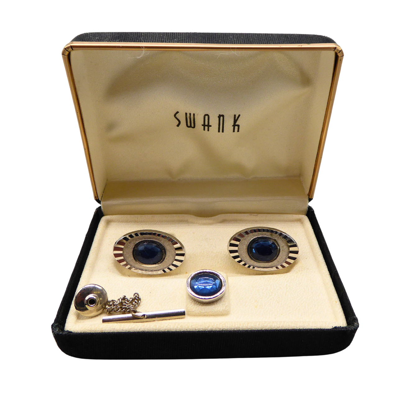 CUFFLINKS AND A MATCHING SWANK TIE PIN.