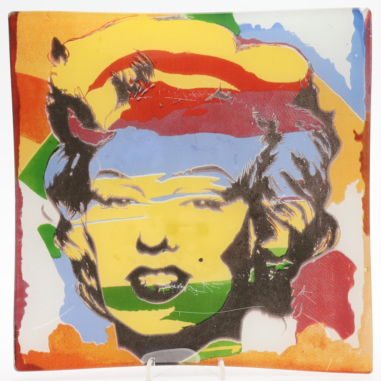 A glass, Marilyn Monroe motif.