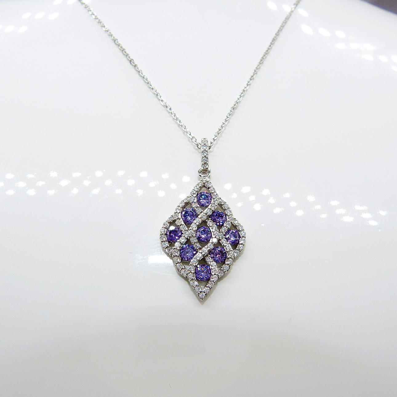 SILVER & PURPLE CUBIC ZIRCONIA NECKLACE.