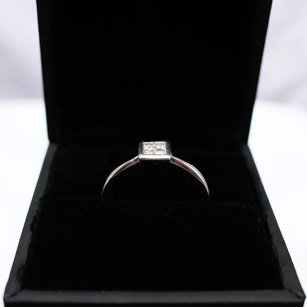PRINCESS CUT DIAMOND RING.