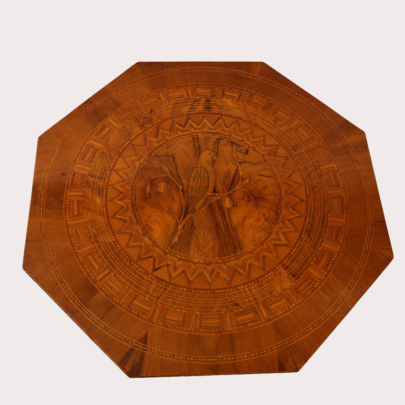 TABLE, octagonal shape, wood with inlays including parrot in fruit ...