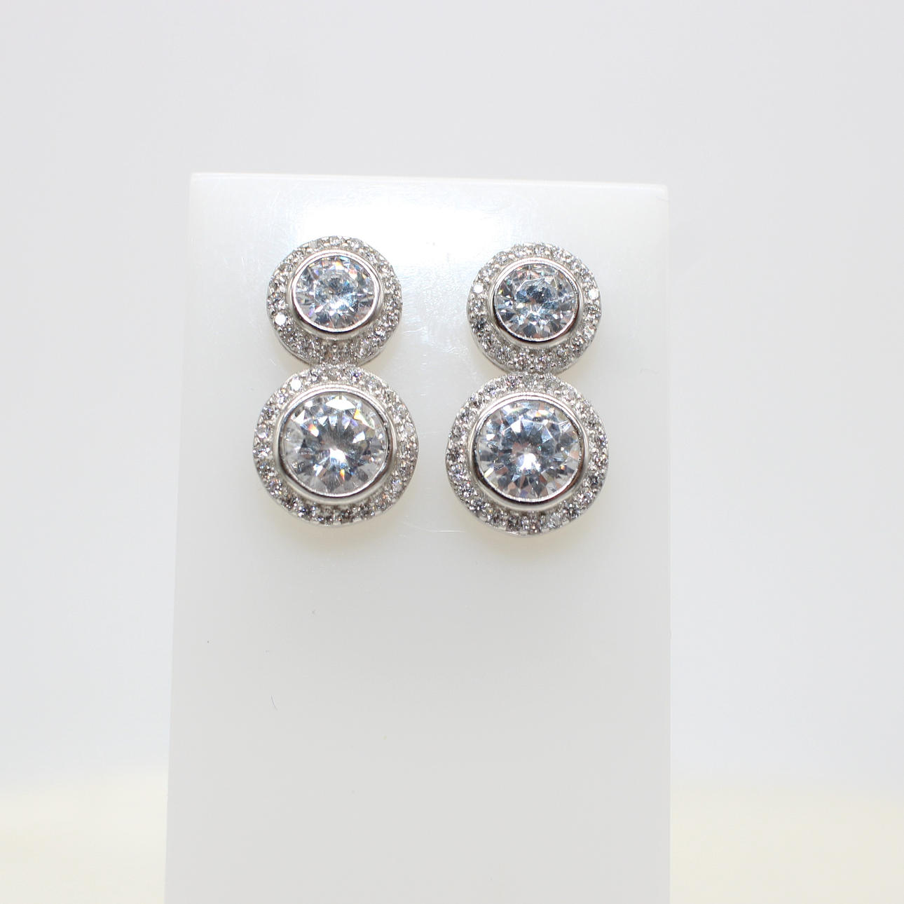 SILVER DUAL SOLITAIRE STUDS.