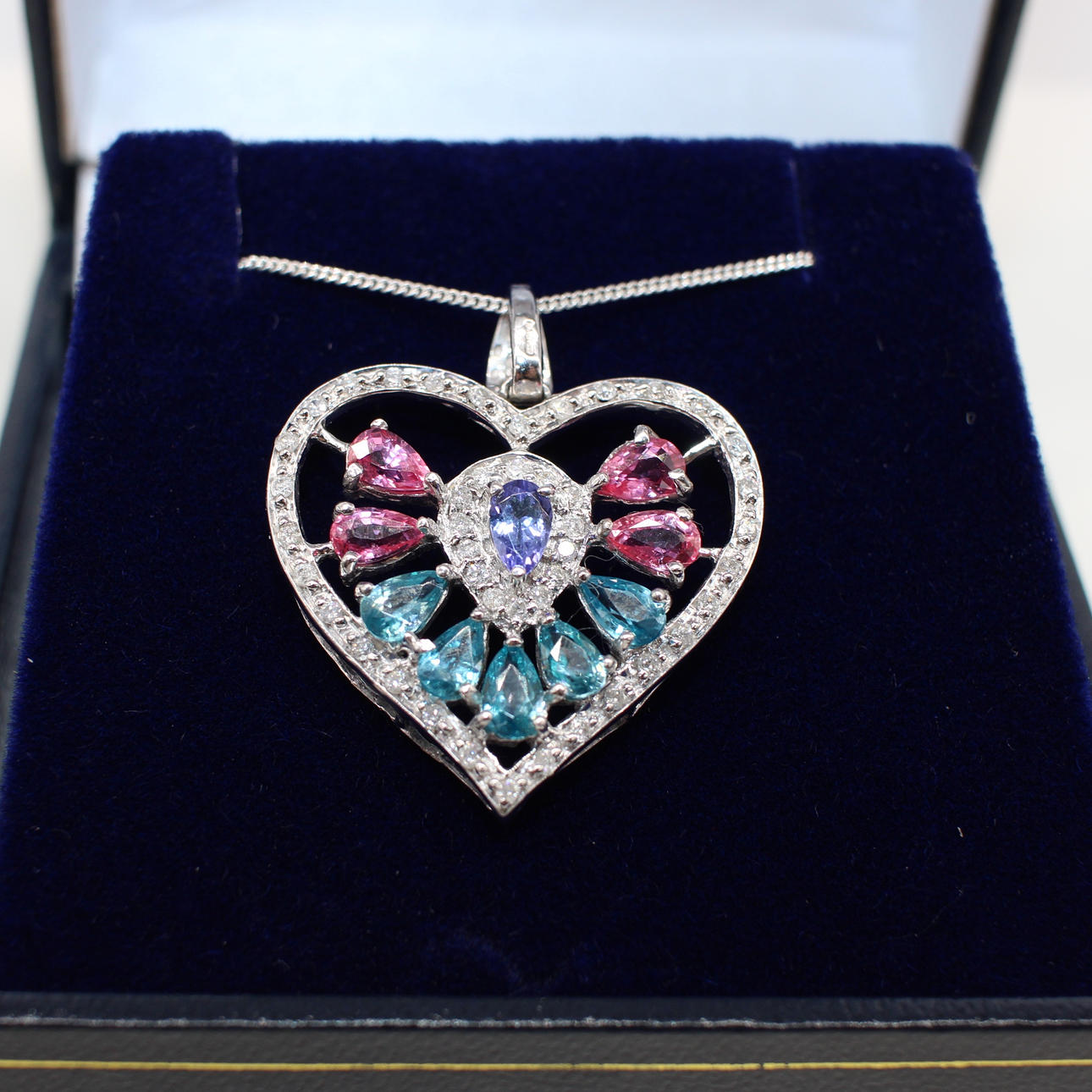 DIAMOND, TANZANITE & TOPAZ PENDANT NECKLACE.