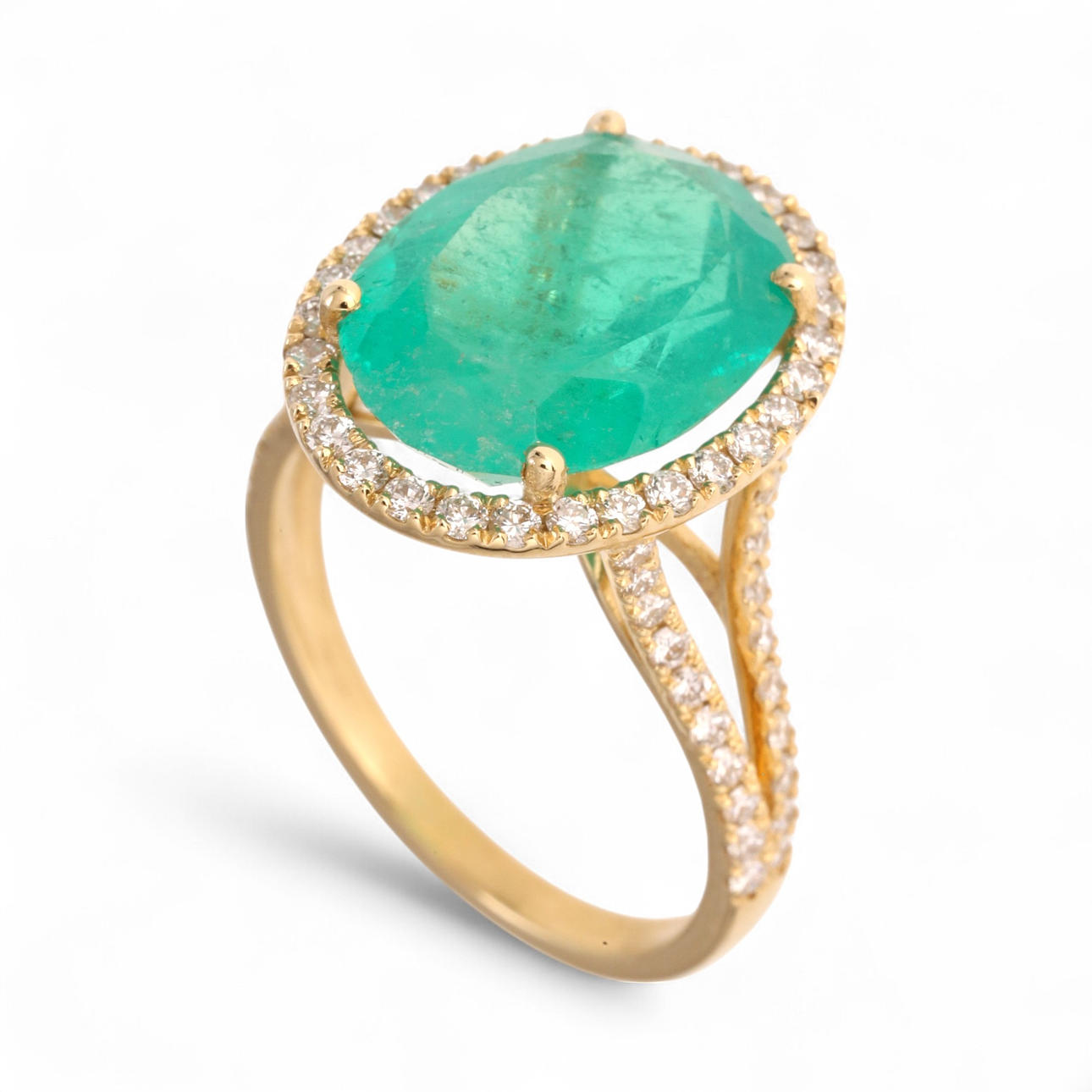 Emerald and diamonds rosette ring.