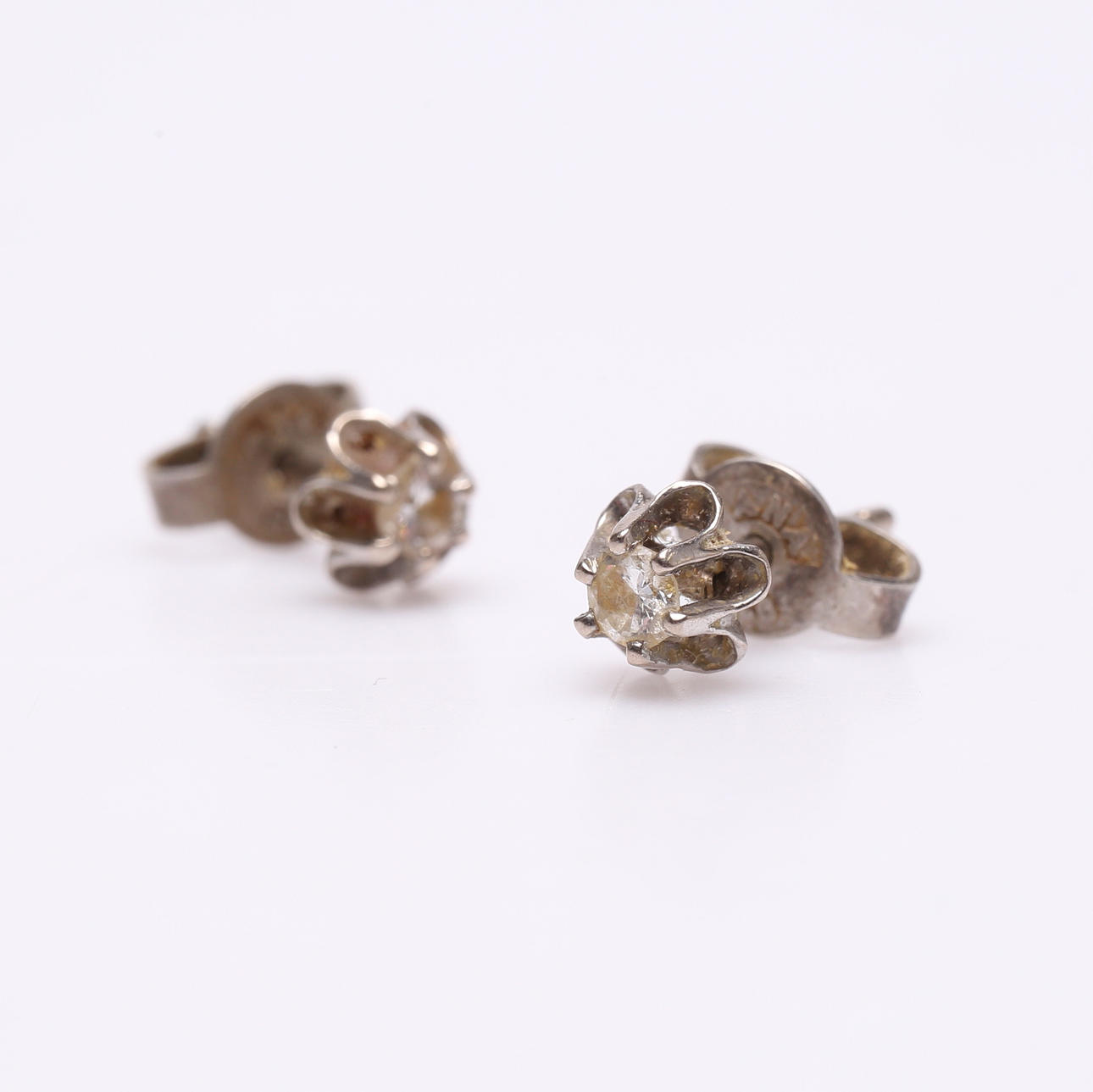 EARRINGS, 1, pair. silver and diamonds.