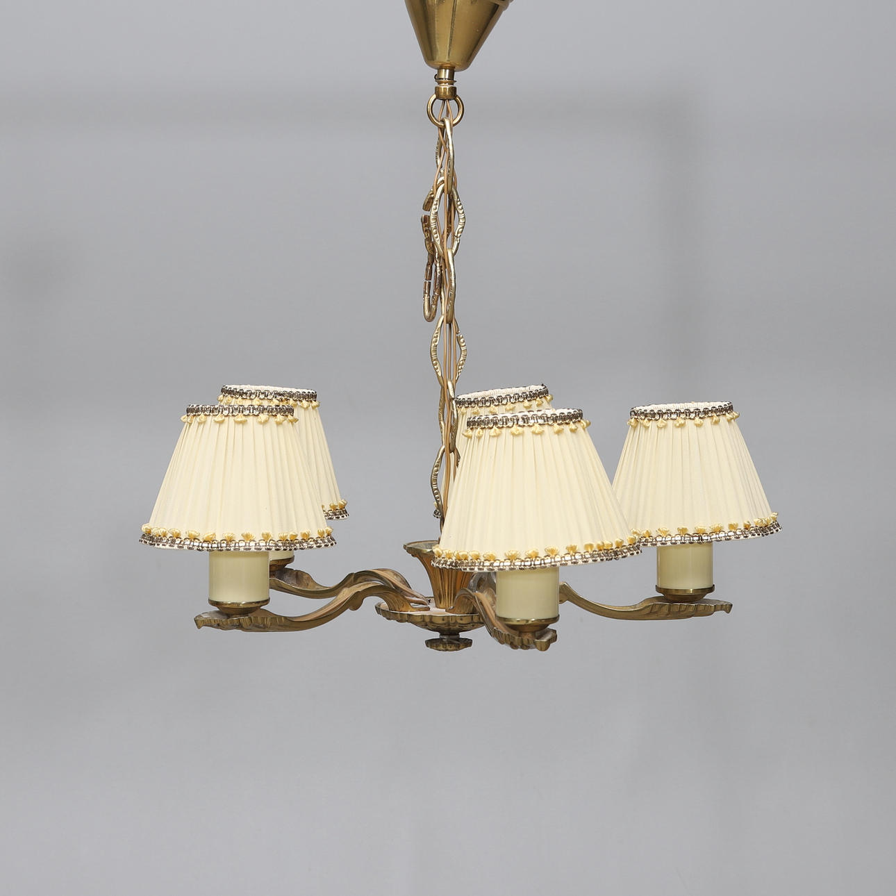 A brass ceiling lamp, 5 light arms, 1940/50's.