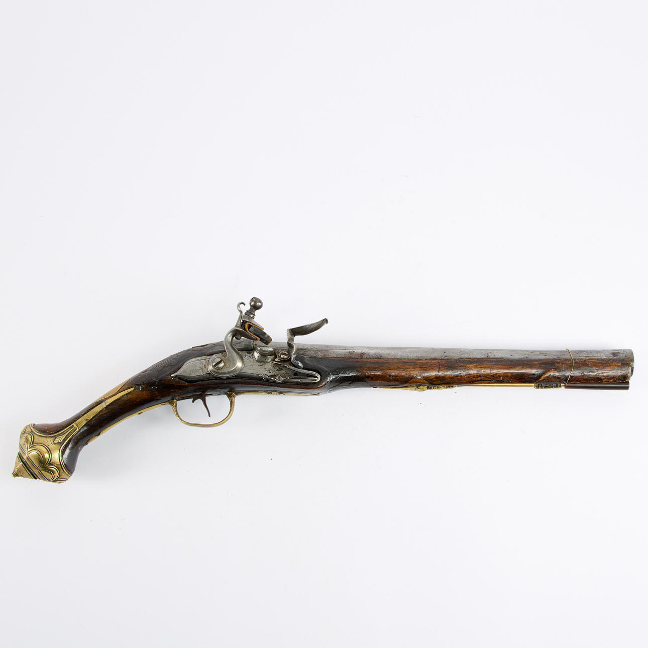 A 17th-19th century flintlock pistol.