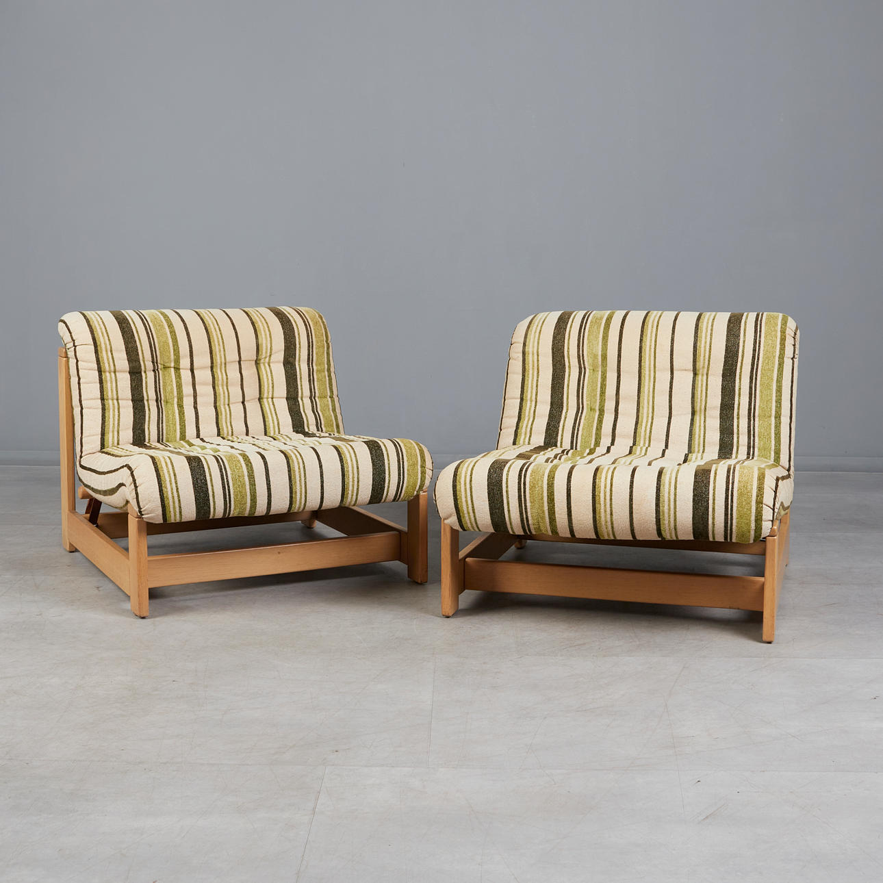 Two lounge chairs/ sofa modules, beech, linen, 1970s, Sweden. (2).