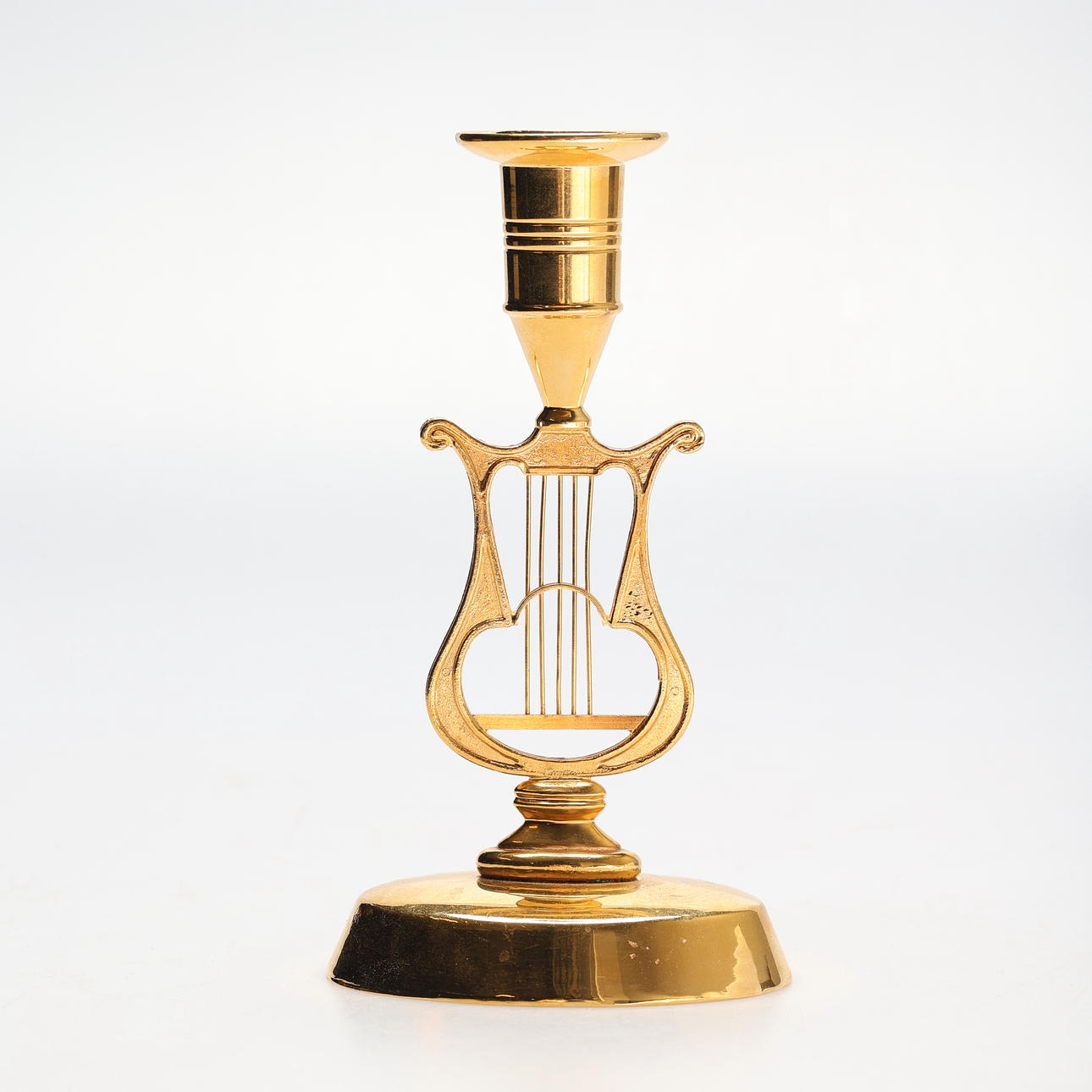 A brass candlestick, gilt, Bollings Gränna.