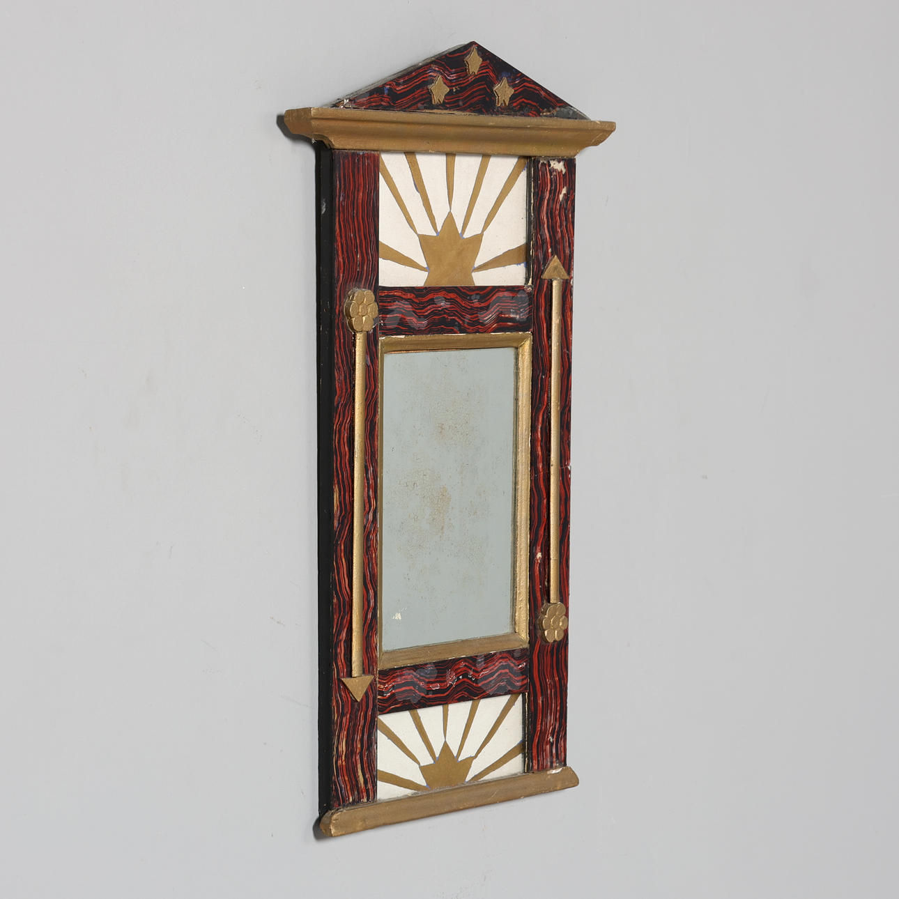 An empire mirror, 19th century.