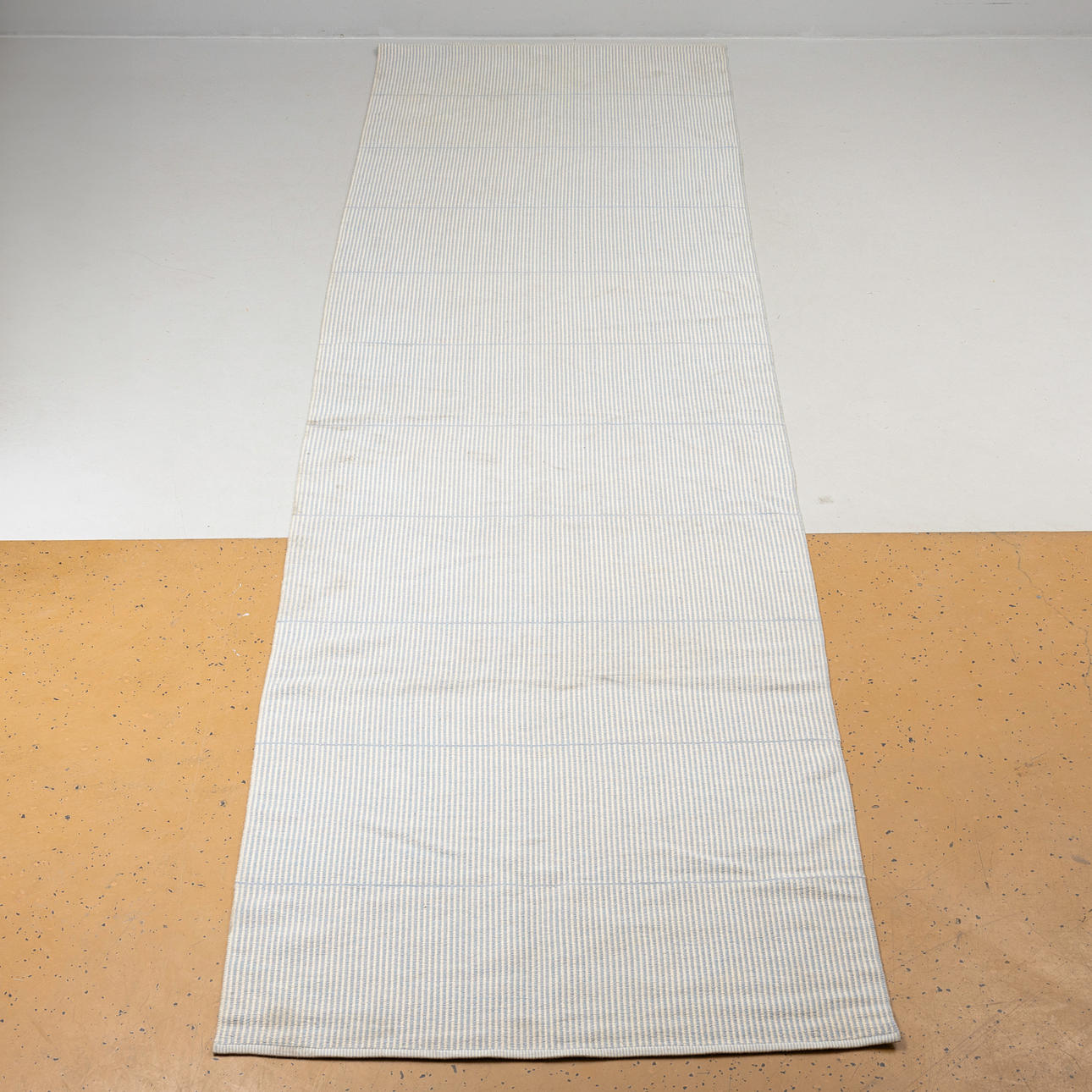 A carpet, wool, possibly Kasthall, ca 565 x 152 cm.