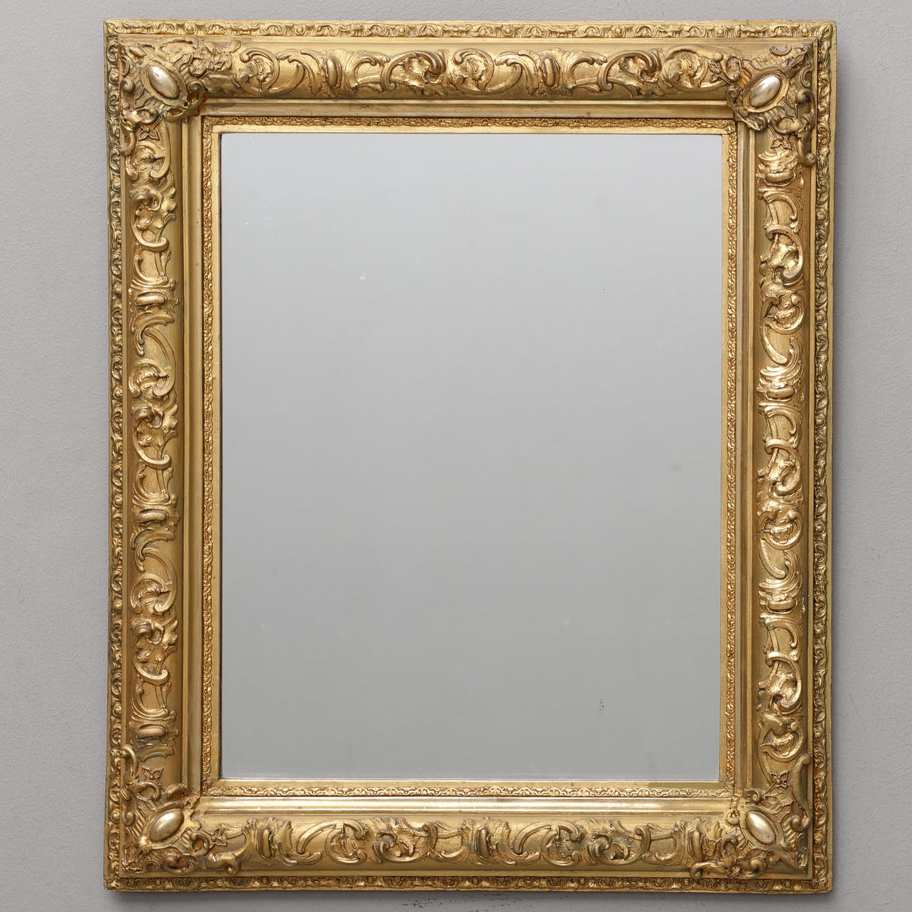 A mirror, bronzed, 1800/20th century.