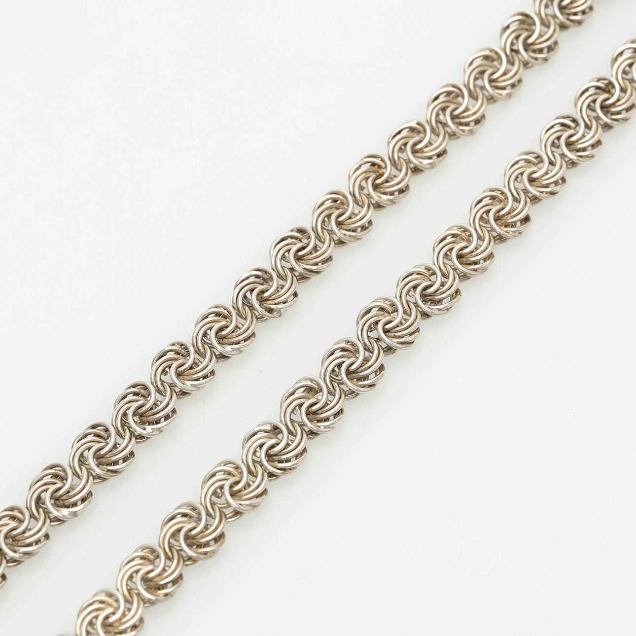 A sterling silver necklace, mid 20th century.