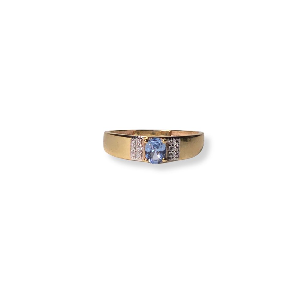 GOLD AND AQUAMARINE RING.