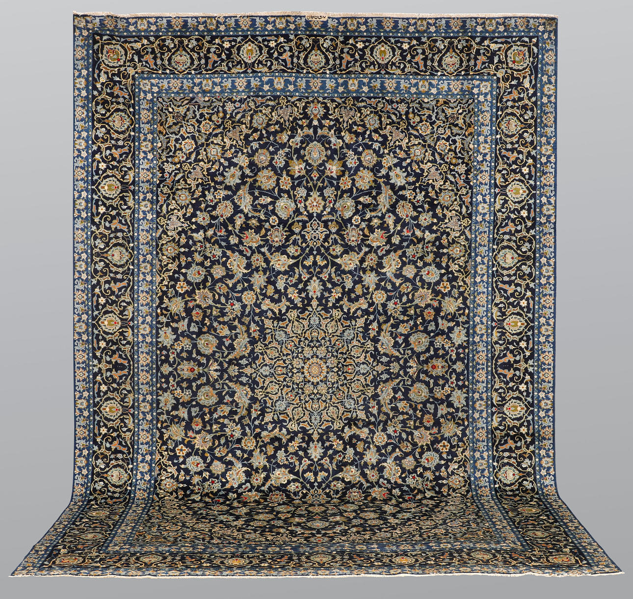 ORIENT CARPET. Blue Keshan signed, 395 x 277 cm.