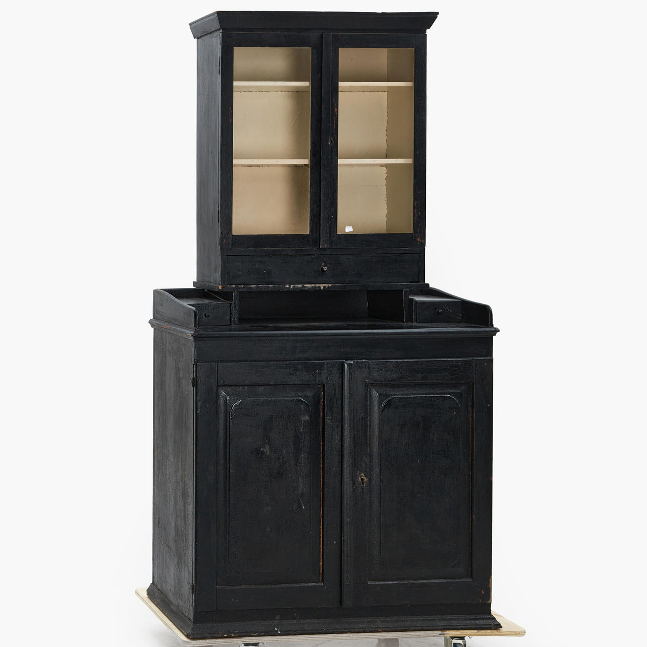 A two-piece sideboard with display cabinet, 19th century.