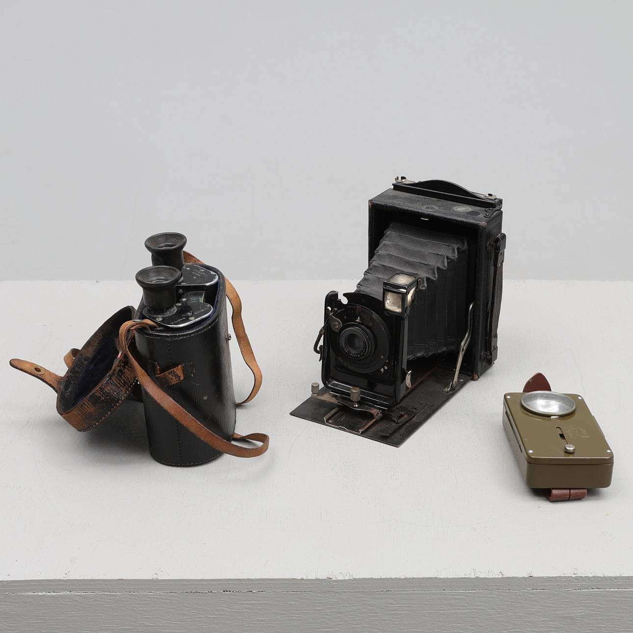 BINOCULARS, CAMERA, FLASHLIGHT.