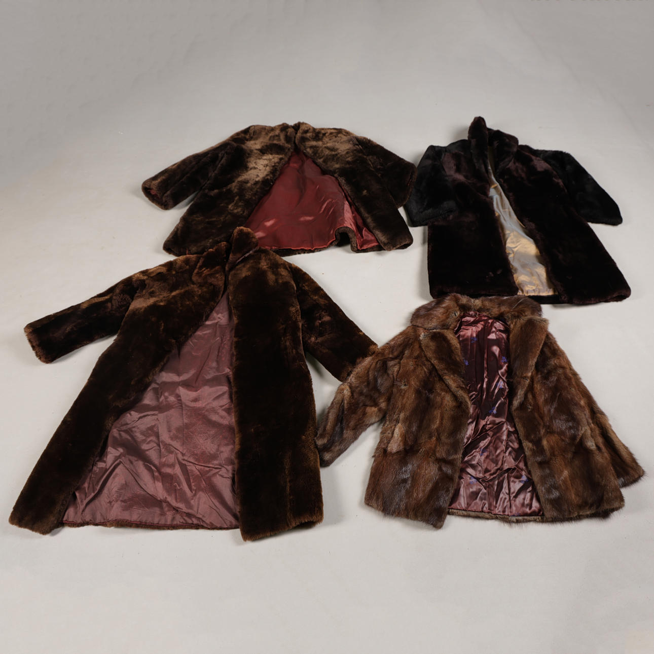 FOUR FUR COATS (4).