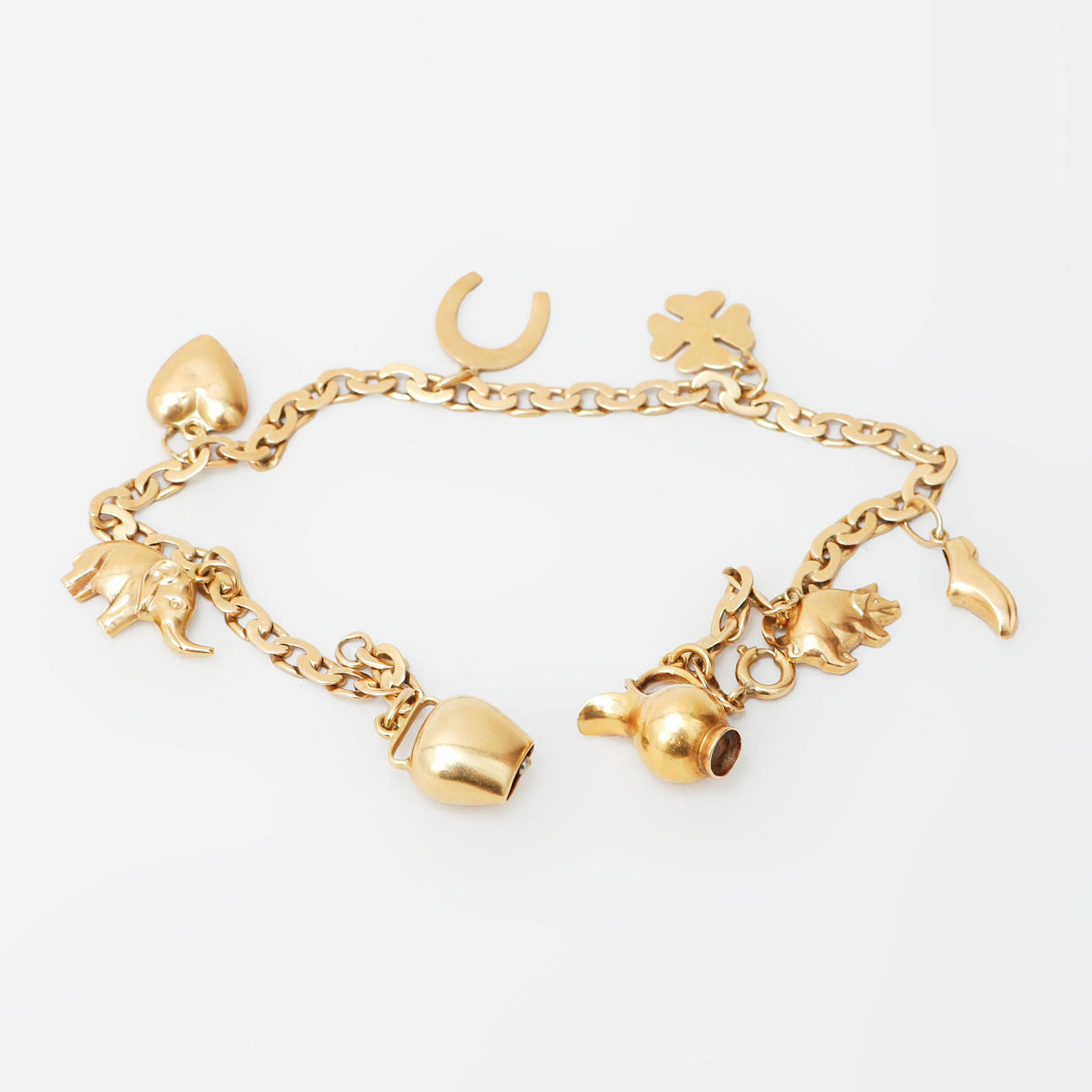 ARMLÄNK med berlocker, 18k guld, vikt ca 14,6 gram.