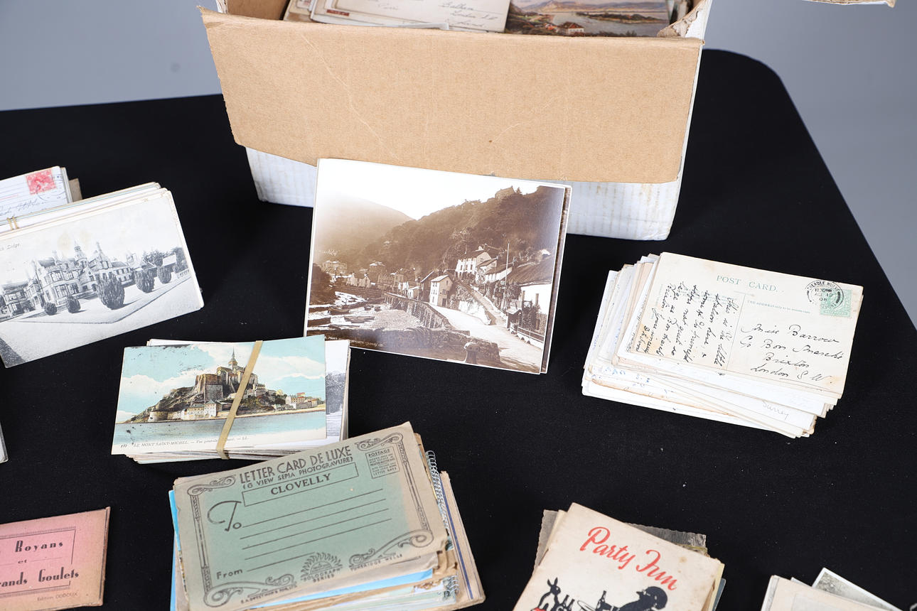 A LARGE COLLECTION OF VINTAGE POSTCARDS AND PHOTOGRAPHS. Miscellaneous ...