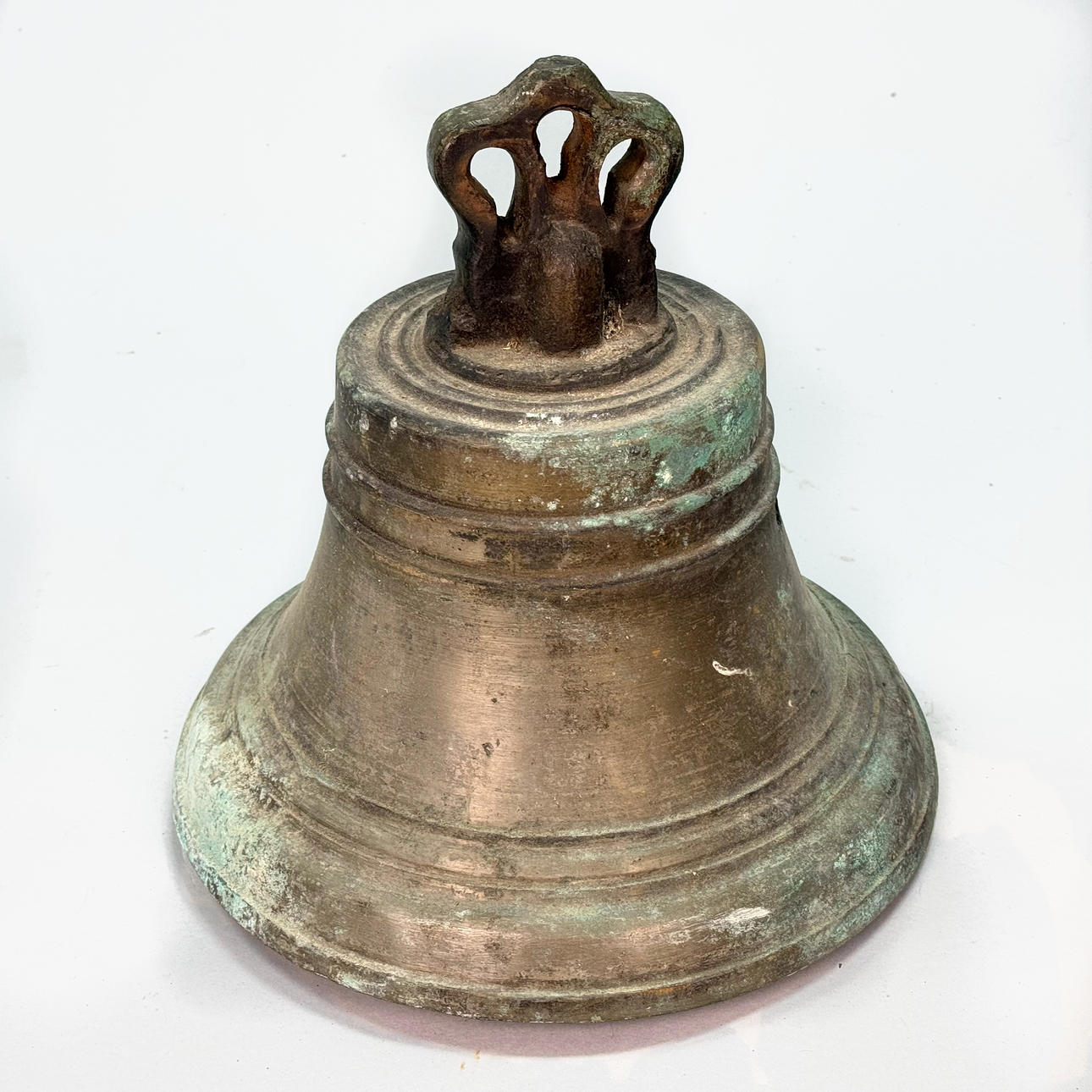 A VÄLLING CLOCK, iron clad in ore, 19th century.