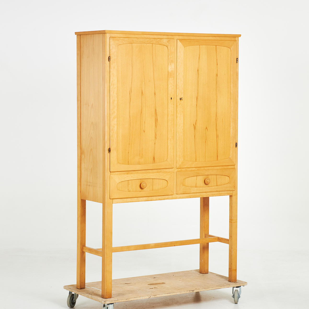 CABINET, designed by architect Sten Blomberg, executed by AB Herbert Andersson, Gärsnäs, almveneer, label marked.