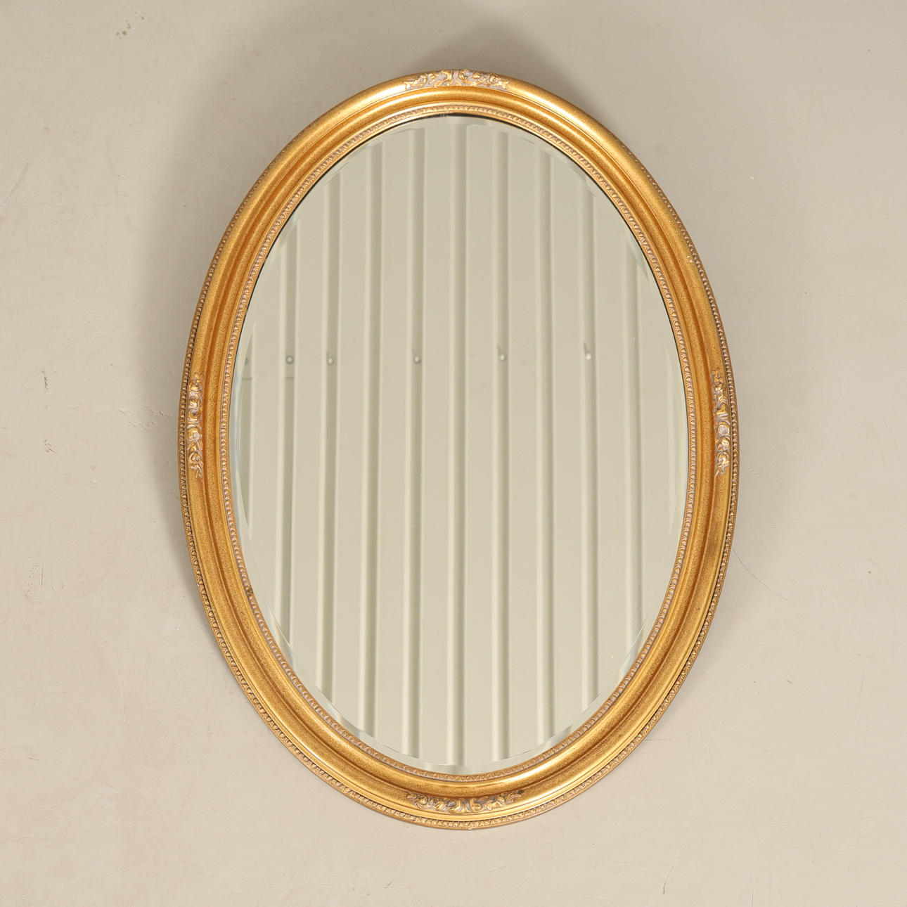 MIRROR gilded frame.