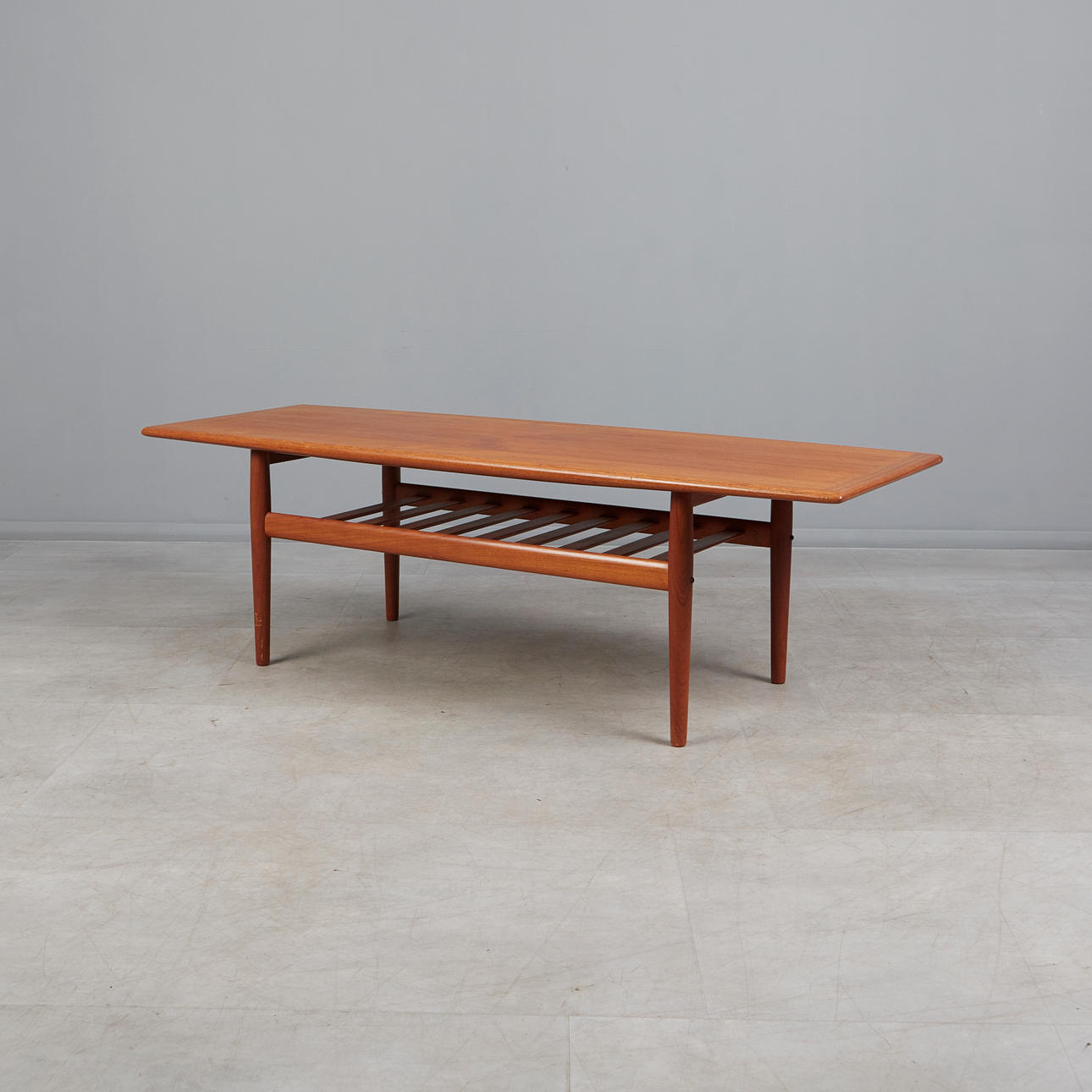 GRETE JALK. Glostrup. Teak coffee table. Denmark, 1960s.