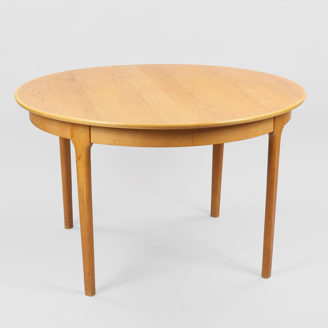 HENRY KJÆRNULF ( 1911 -1975). Circular dining table with additional plate Model 62. Designed 1958. Sorø Chair Factory. Denmark (2).