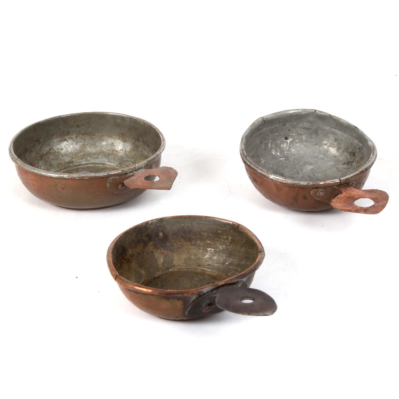 Three 19th century copper bowls.