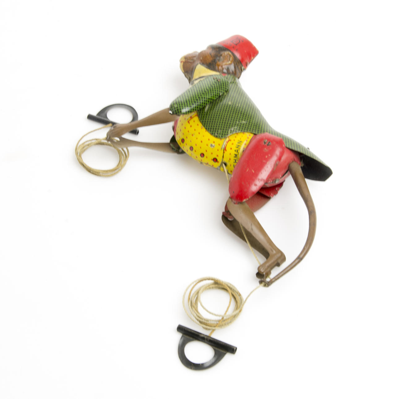 MEKANISK LEKSAK, litograferad plåt, "Tom 385", Lehmann, Tyskland, 1900-talets första hälft.