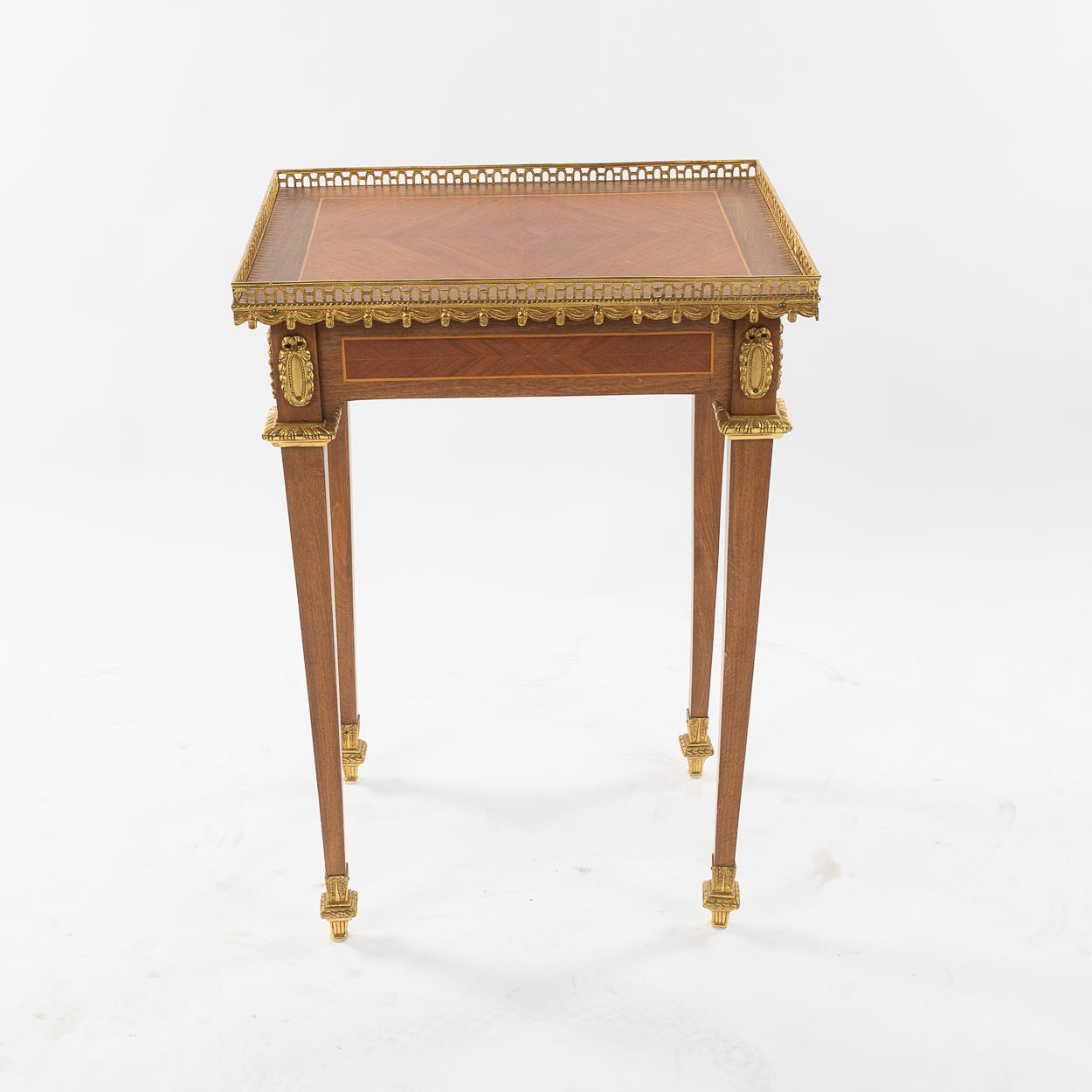 A Louis XVI style side table. Mid 20th century.