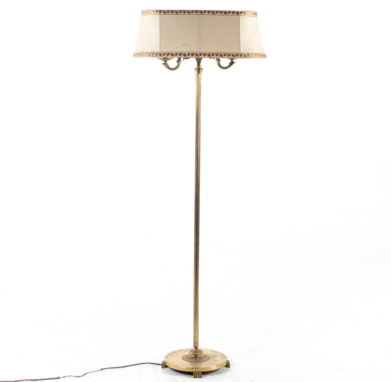 A brass floor lamp, mid 20th century.