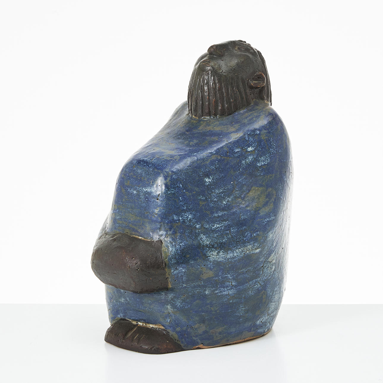ÅKE HOLM. Sitting man, stoneware, signed.