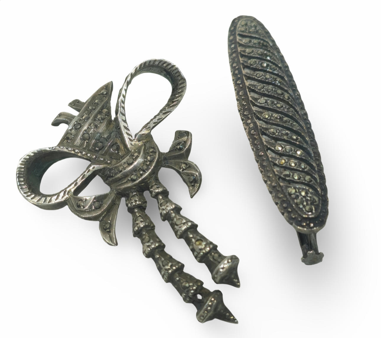 Two Elizabethan silver brooches with marquesitas.