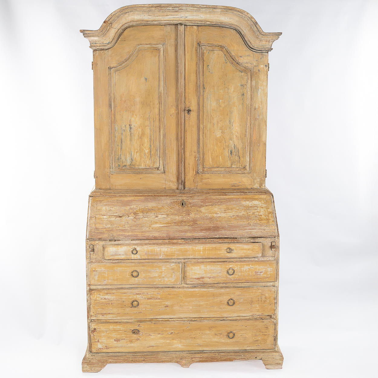 A two-piece rococo cabinet, provincial work, early 19th century.