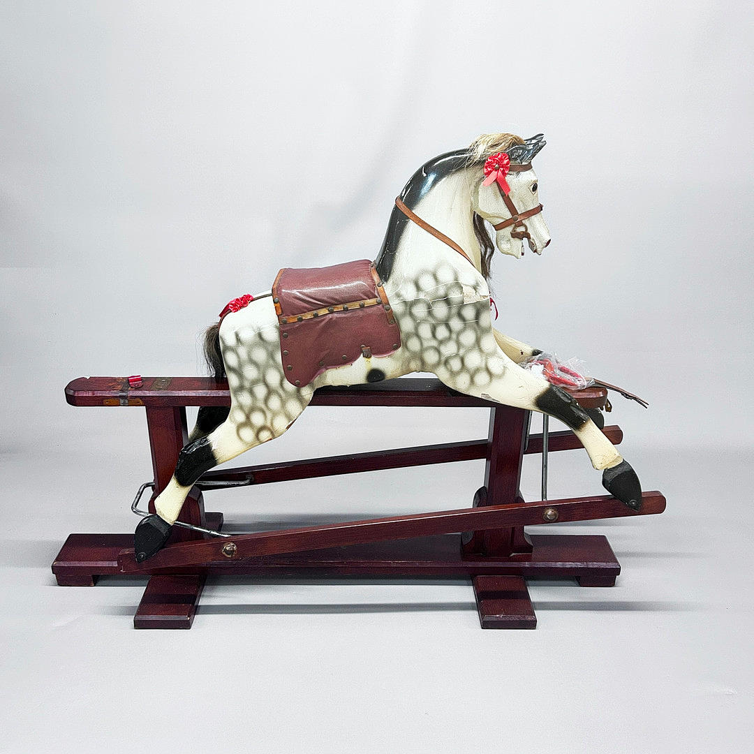 VINTAGE ROCKING HORSE.