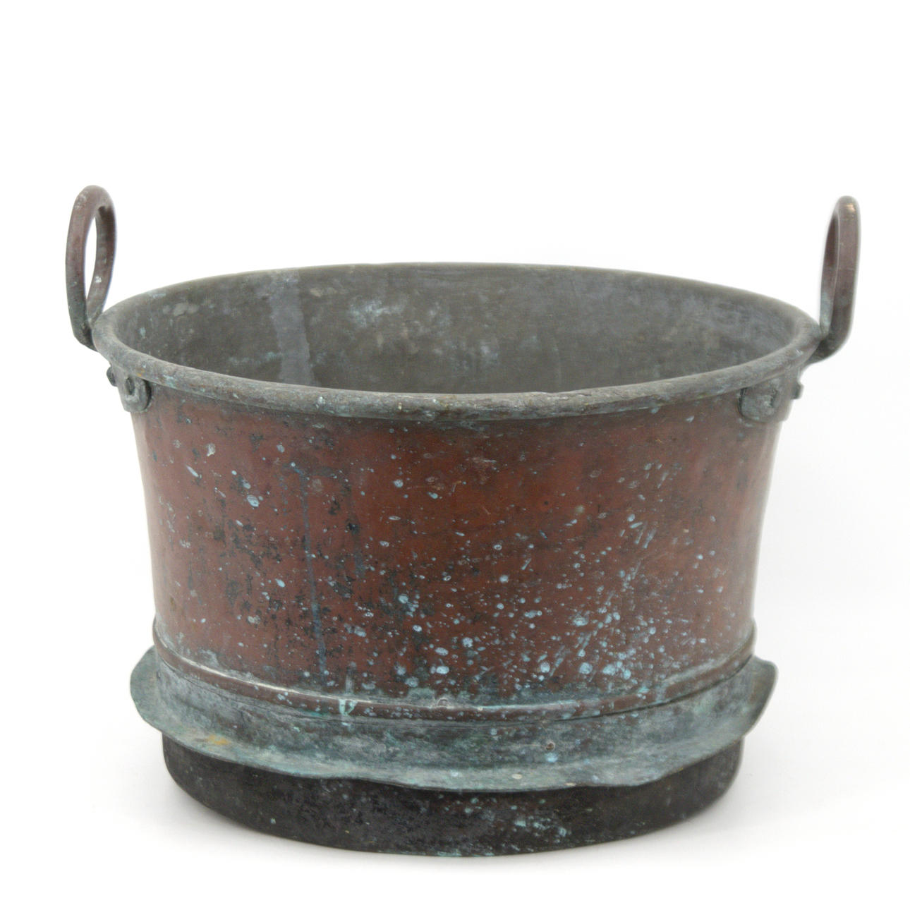 A 20th-century copper cauldron with hangers.