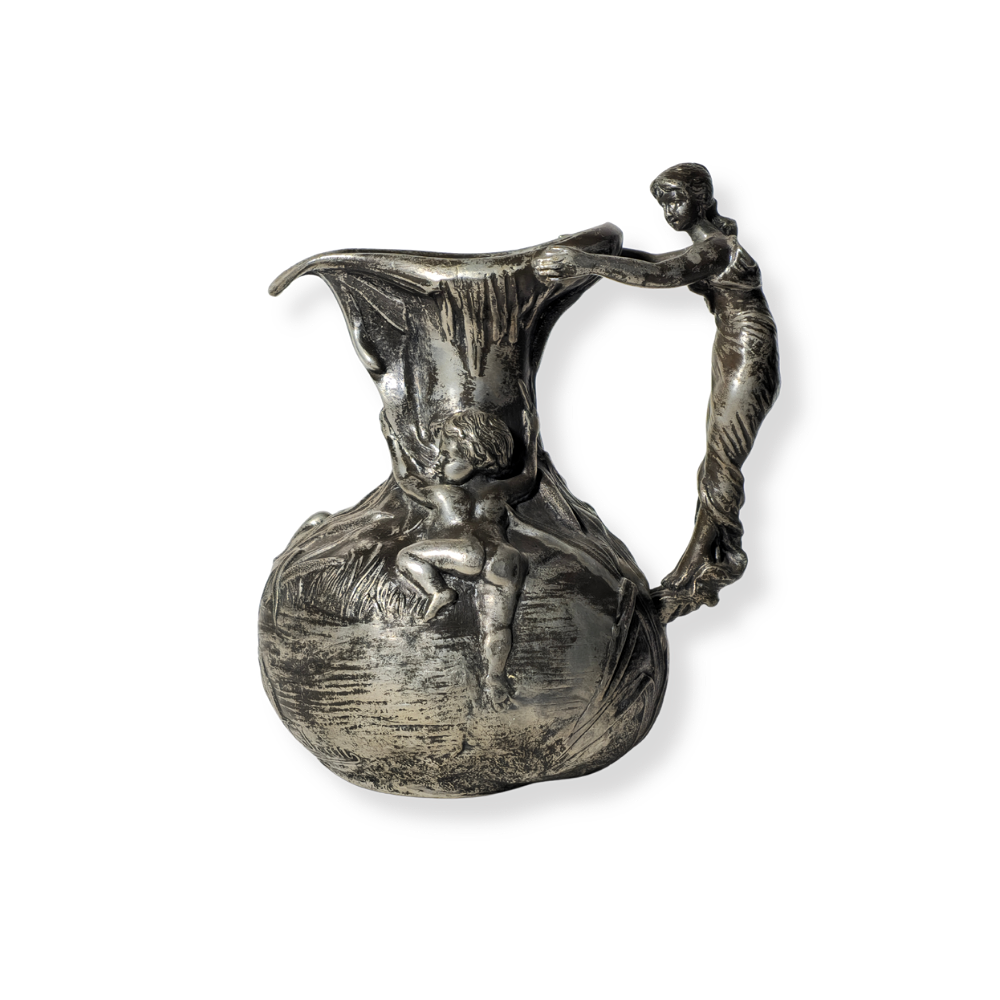 MODERNIST TIN JUG. SIGNED BY P. JEAN.