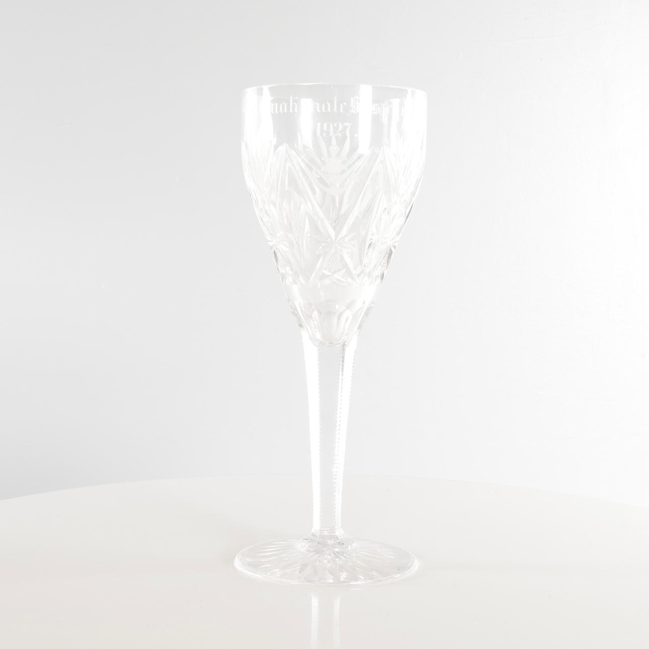 Glass trophy with facet grinding.