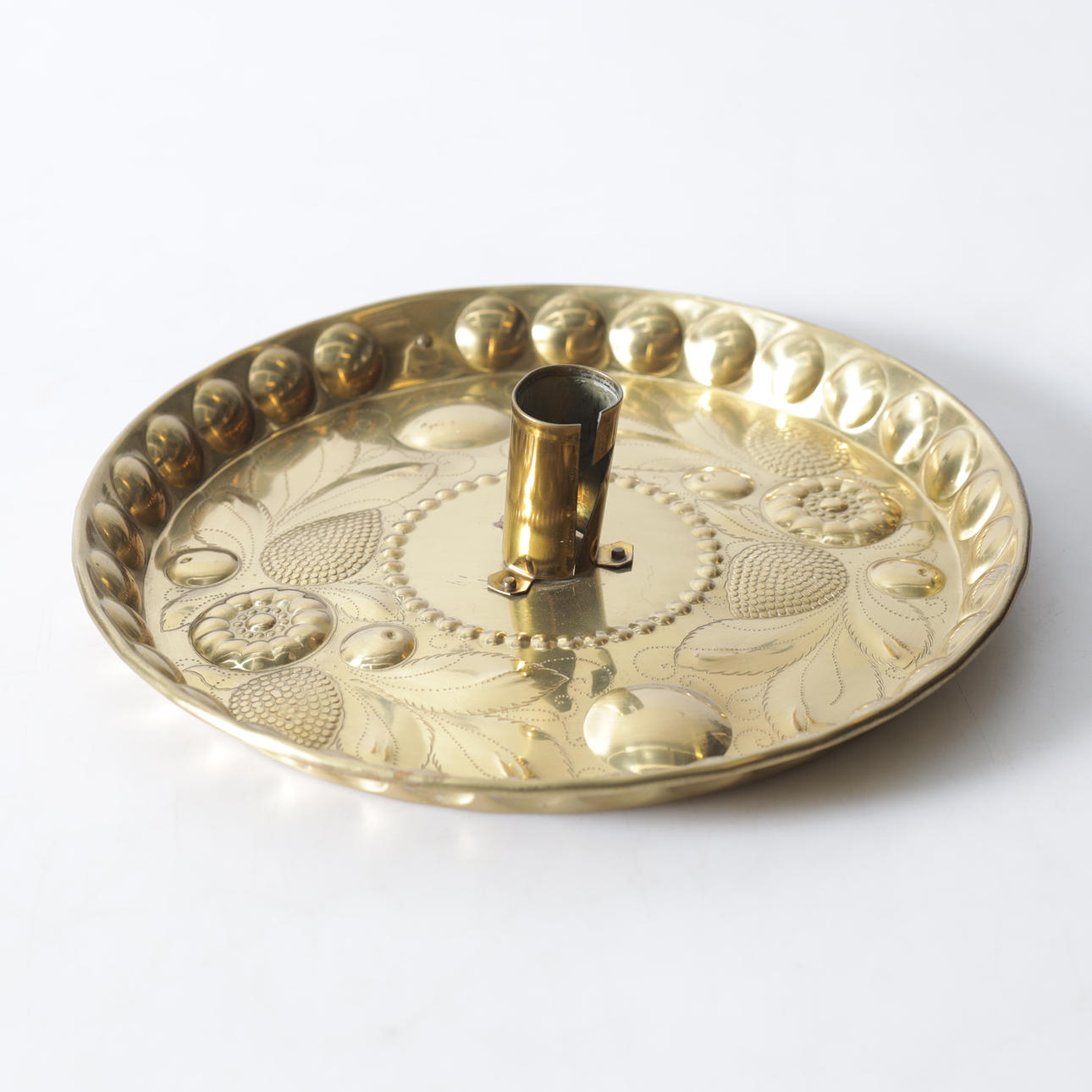 A brass candlestick, Claestorp, Nyköping, 20th century.