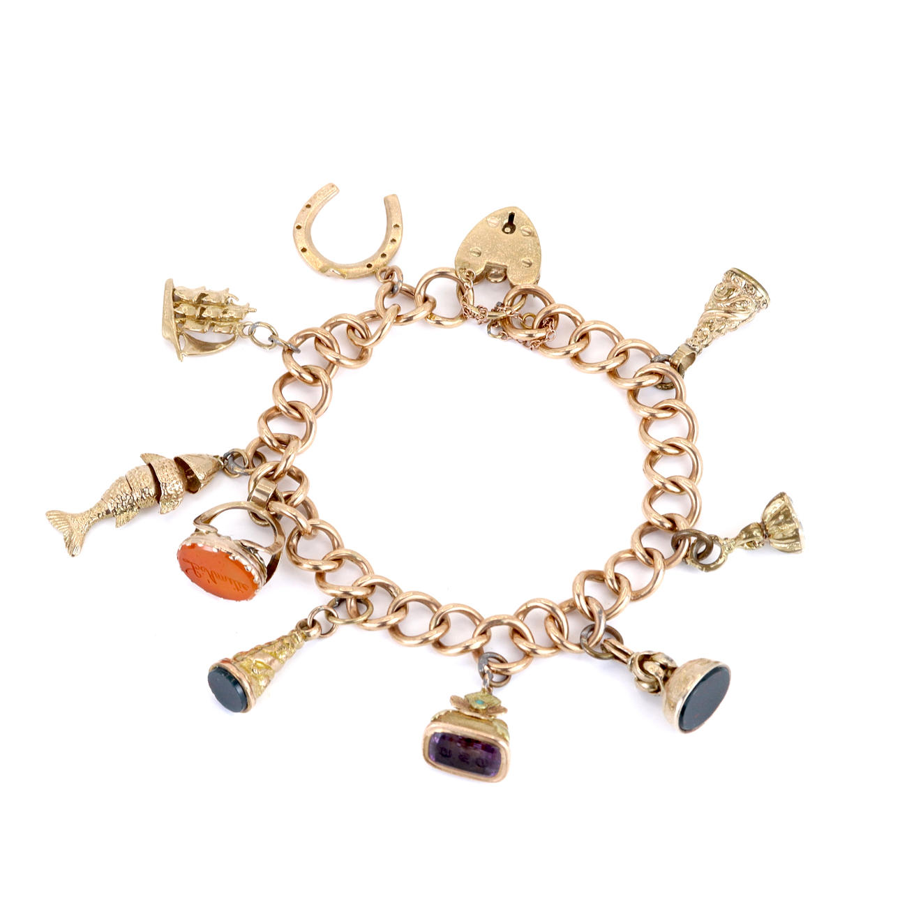 ANTIQUE 9CT YELLOW GOLD CHARM BRACELET.