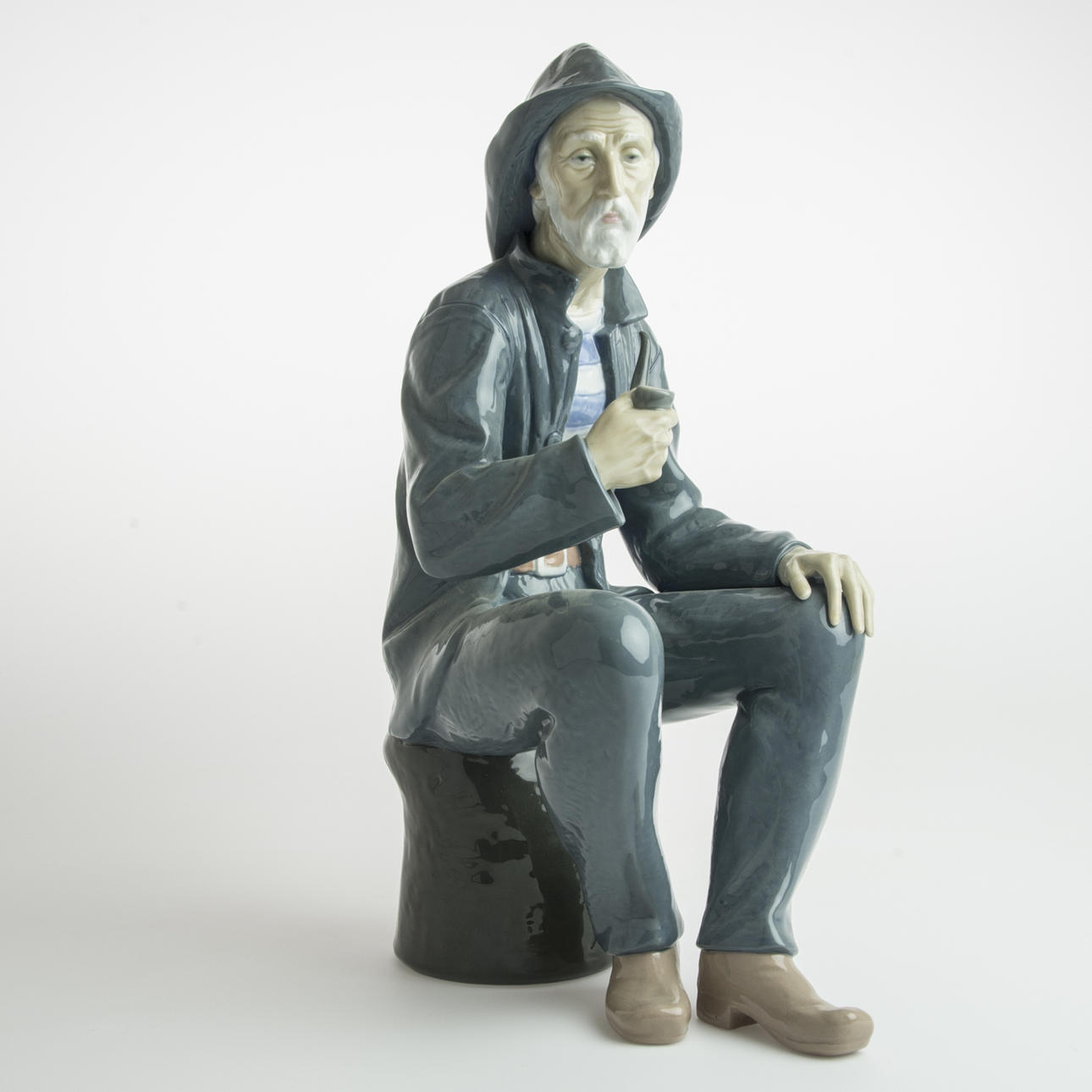 FIGURIN, porslin, piprökande man, Nao.