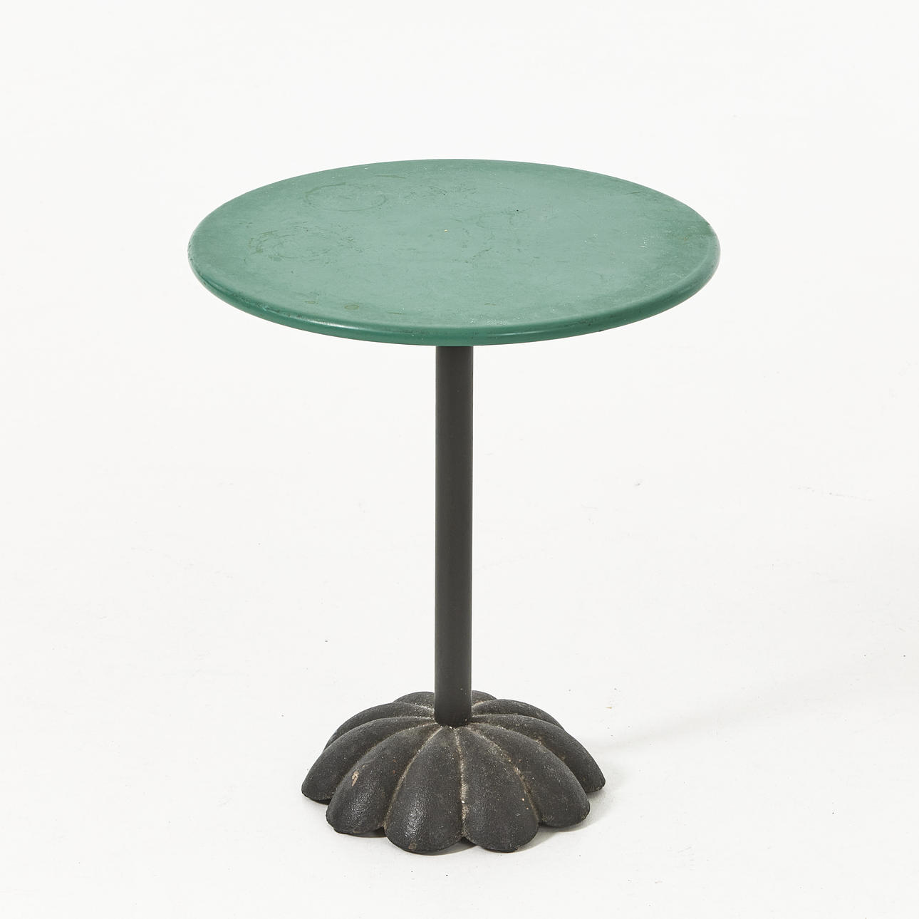 A 20th-century cast iron garden table.
