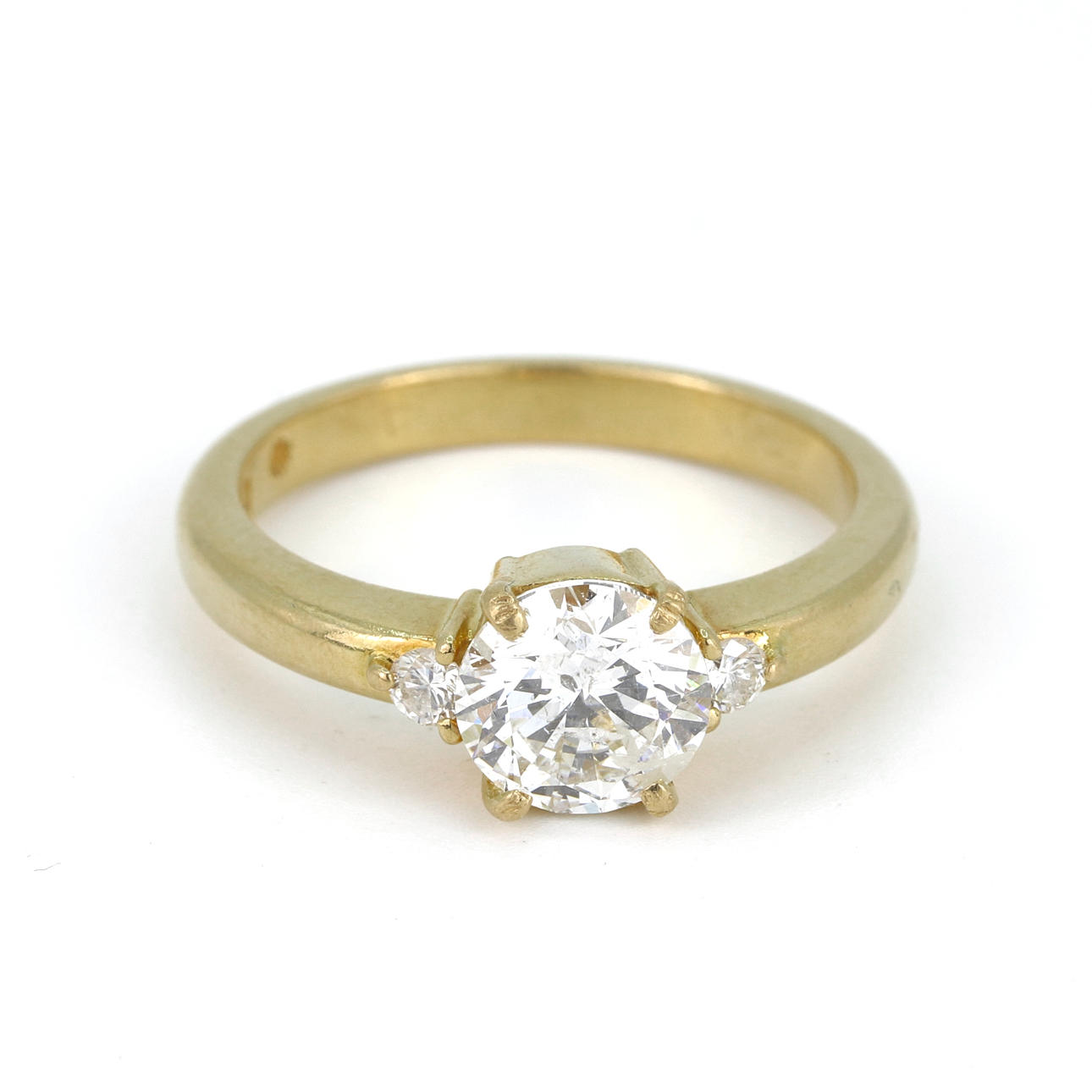 18CT YELLOW GOLD DIAMOND SOLITAIRE RING.