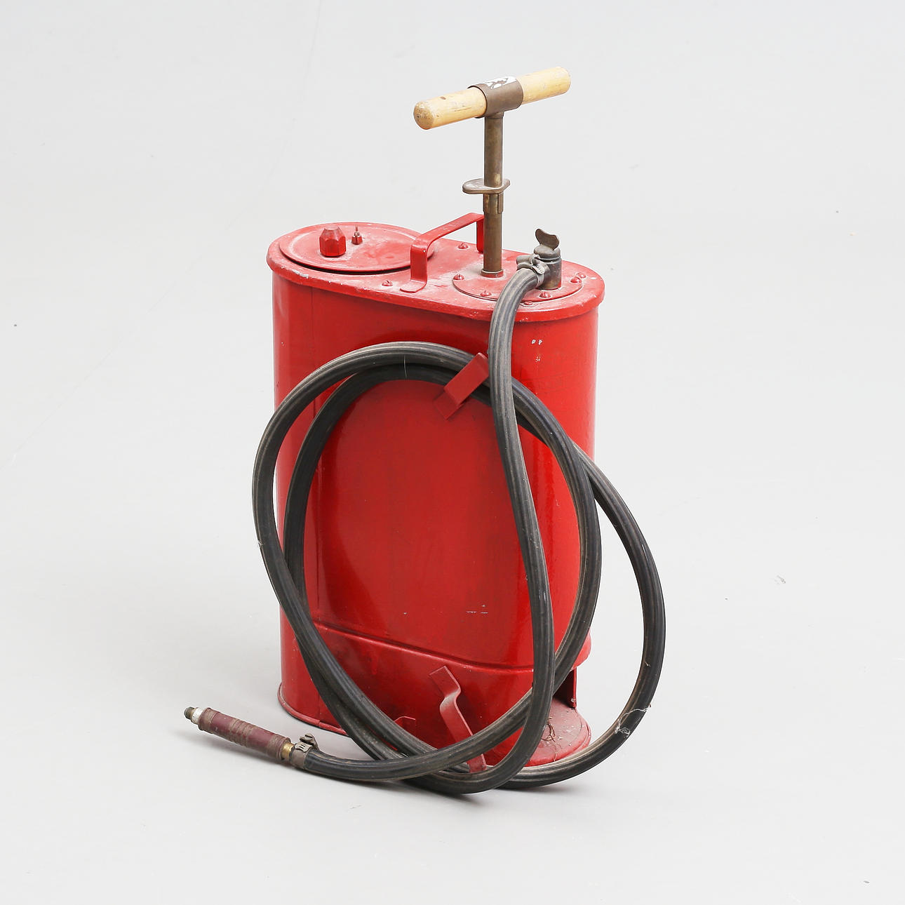 A fire extinguisher, mid 20th century.