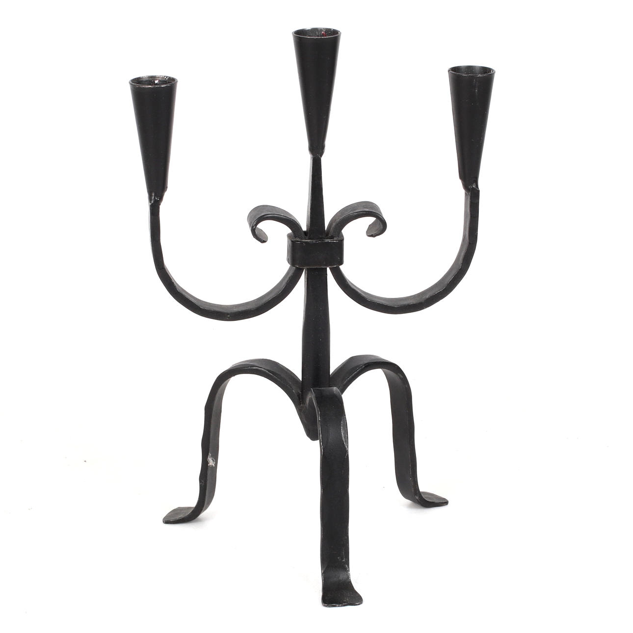 A 20th century wrought candlestick.