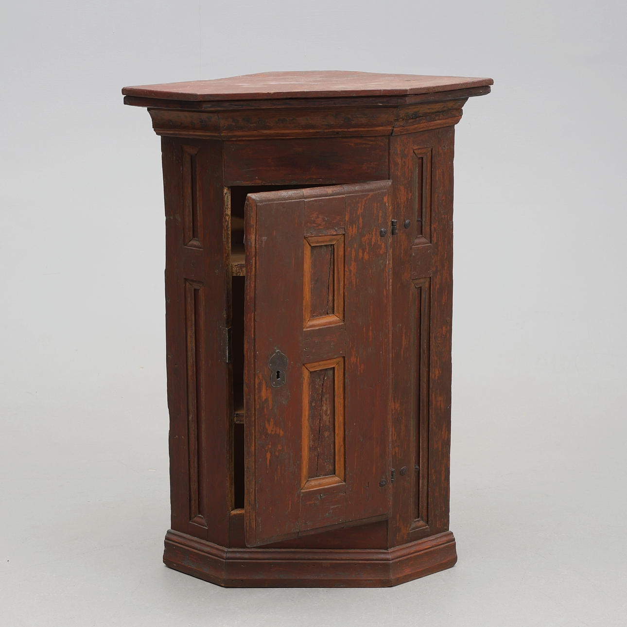 A 17th/19th century corner cabinet.