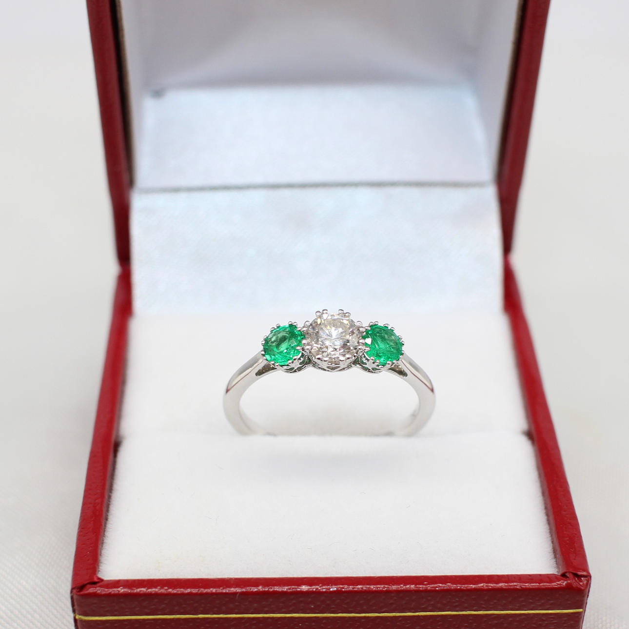 EMERALD & DIAMOND TRILOGY RING.