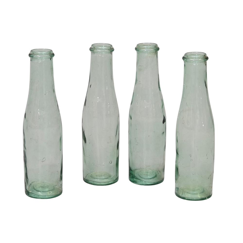 4 ANTIQUE GLASS MILK BOTTLES.